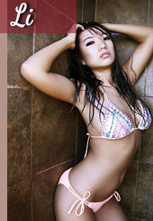 Li is a sensual Asian posing in a string bikini